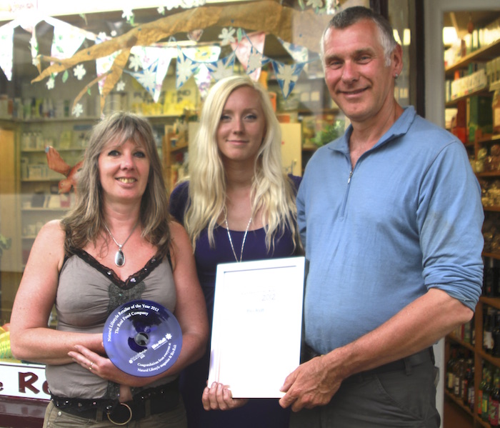 Family photo with trophy